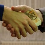 10_-_hands_shaking_with_euro_bank_notes_inside_handshake_-_royalty_free,_without_copyright,_public_domain_photo_image_01