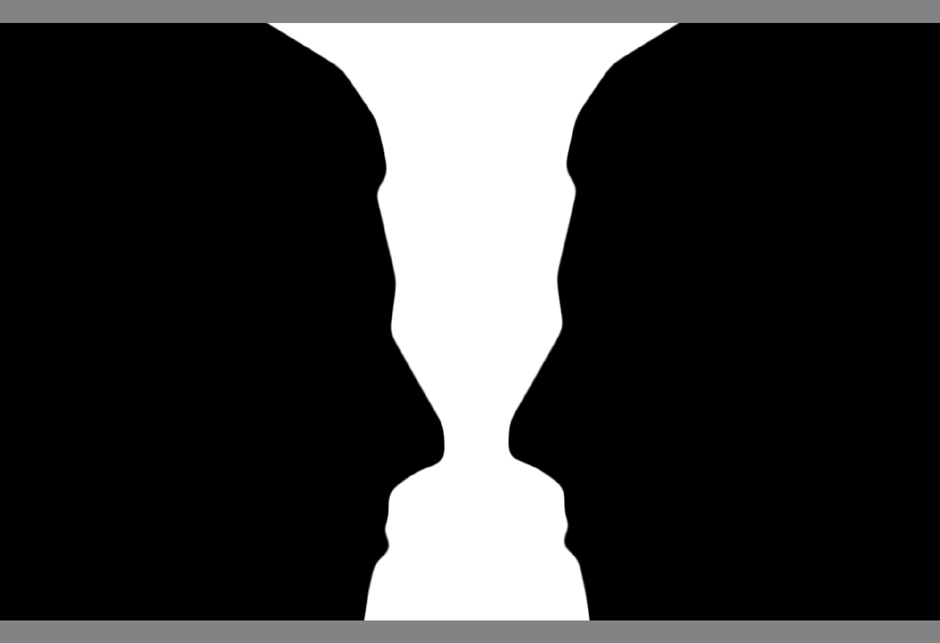 Two_silhouette_profile_or_a_white_vase