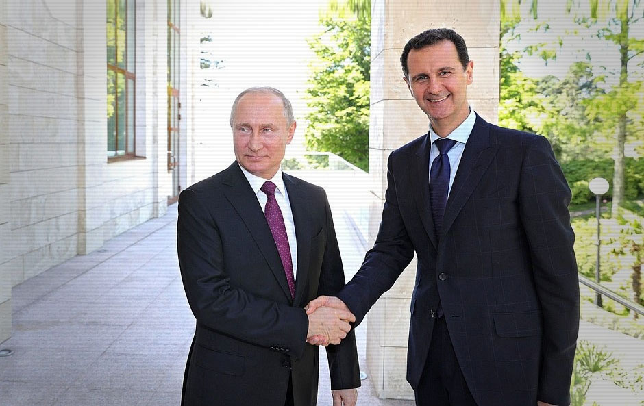 Putin i Assad se rukuju