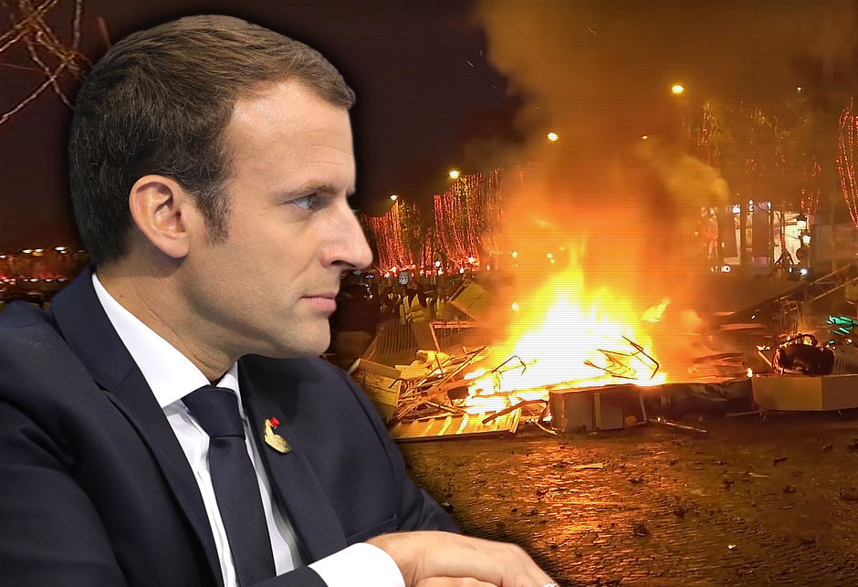 Macron i zapaljeni Pariz