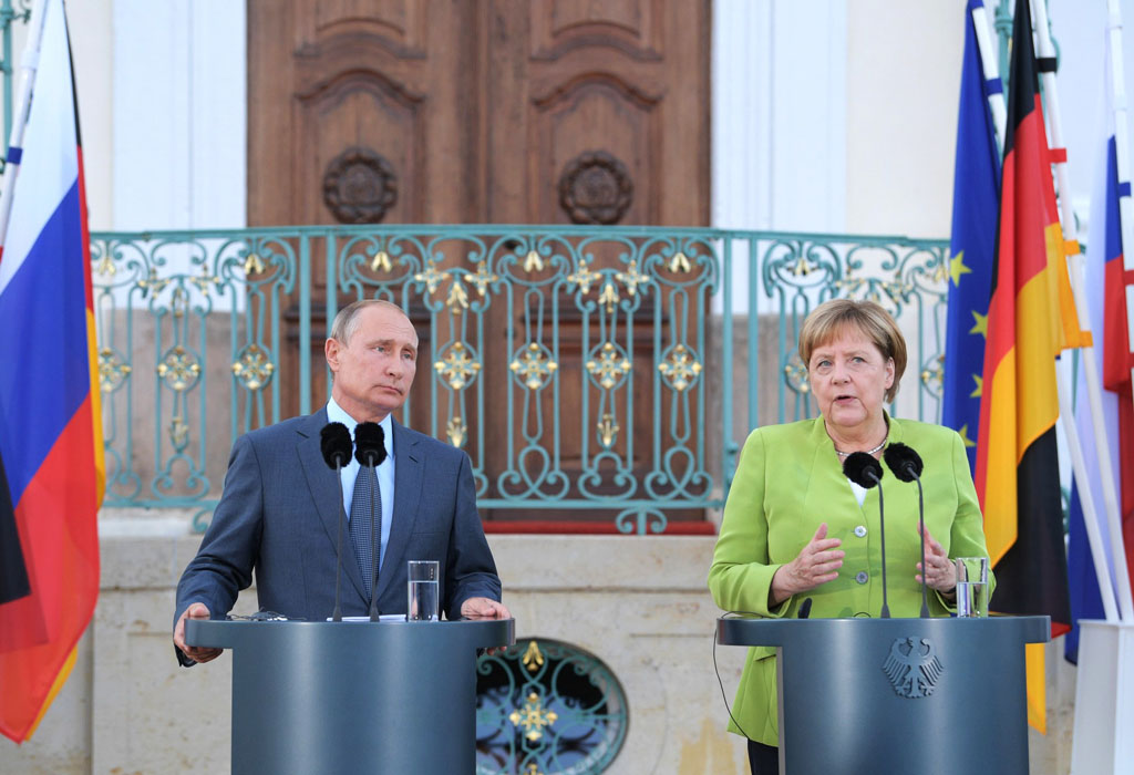 Vladimir Putin i Angela Merkel