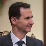 Bashar al-Assad nasmijan sa strane