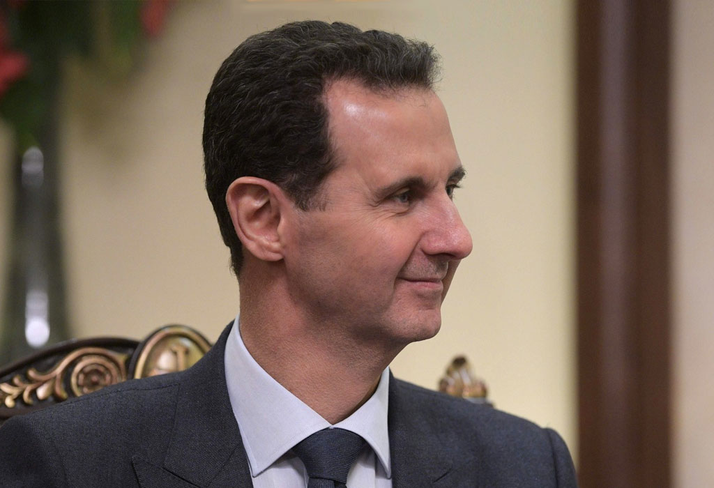 Bashar al-Assad nasmijan sa strane