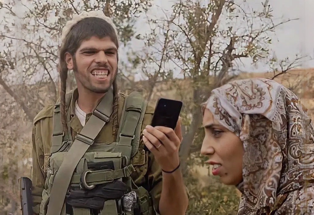 Izraelski vojnik i Palestinka